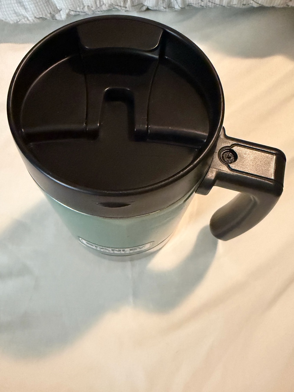 Stanley Mint Green Travel Mug with Black Handle and Stainless Base - Picture 3 of 9